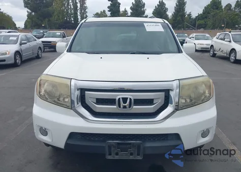 2010 Honda Pilot Touring z USA, uszkodzony, nr VIN 5FNYF3H85AB003993